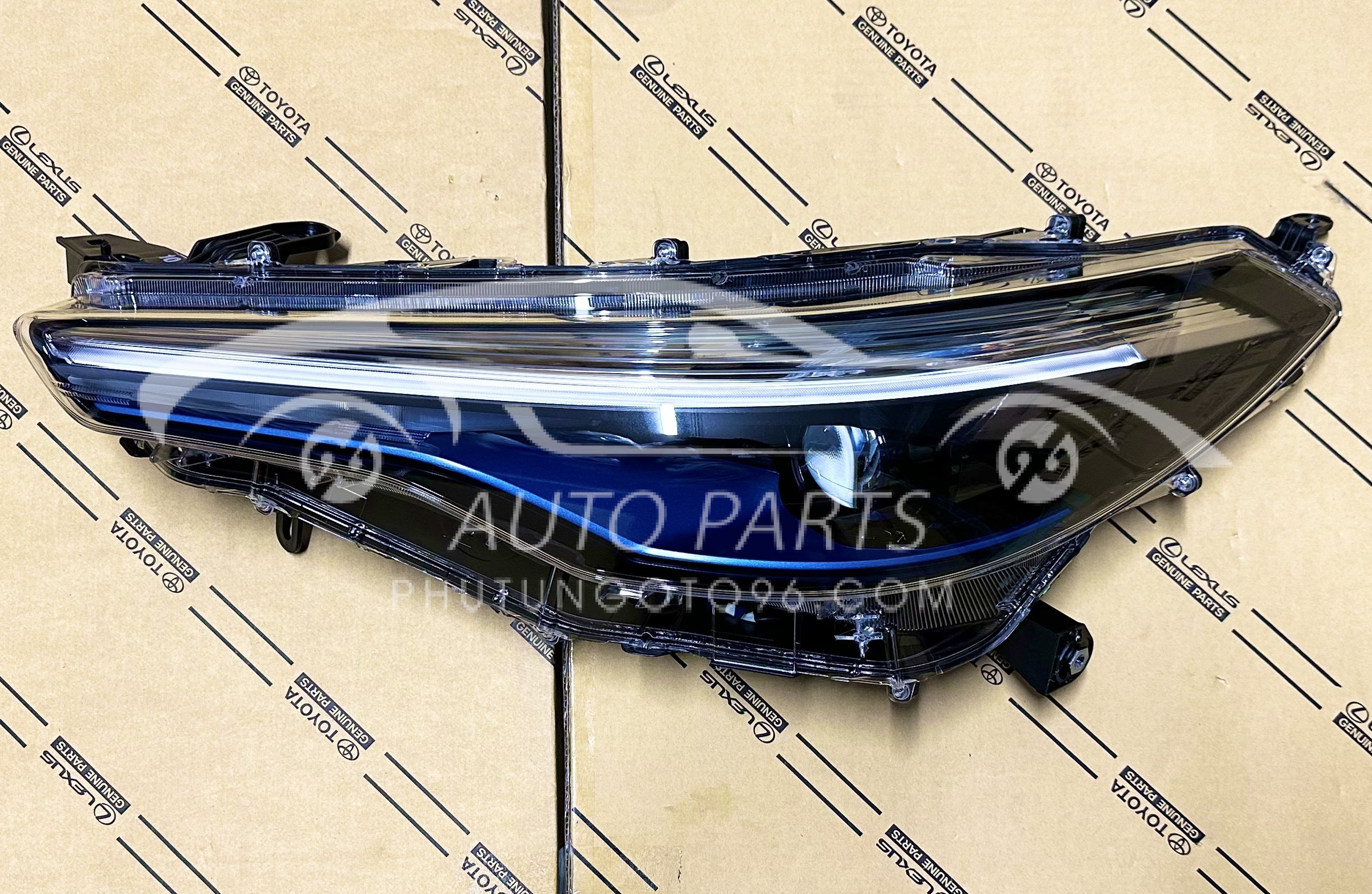 81106-0A100 Đèn pha Cross HV LH